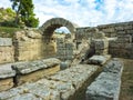 Arch at entry to Stadium, Olympia - Ruins of the ancient Greek city of Olympia, Peloponnese, Greece. Royalty Free Stock Photo