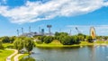 Olympiapark in summer, Munich, Germany. Scenic view of Olympic stadium and lake. Panorama of famous Munich sport area