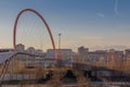 Olympic Arch of Turin. Buildings and white mountains on background. Lingotto district. Turino. Italy. Royalty Free Stock Photo