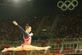 Olympic champion Aly Raisman of United States competes on the balance beam at women's team all-around gymnastics