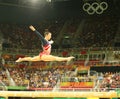 Olympic champion Aly Raisman of United States competes on the balance beam at women's team all-around gymnastics Royalty Free Stock Photo