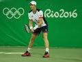 Olympic champion Andy Murray of Great Britain in action during men`s doubles first round match of the Rio 2016 Olympic Games Royalty Free Stock Photo