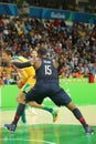 Olympic champion Carmelo Anthony of Team USA R and David Andersen of Australia in action during group A basketball match