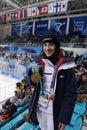 Olympic champion in Ladies` Moguls Perrine Laffont of France posing with gold medal