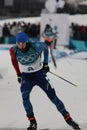 Olympic champion Martin Fourcade of France competes in biathlon men`s 12.5km pursuit at the 2018 Winter Olympics Royalty Free Stock Photo