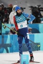 Olympic champion Martin Fourcade of France competes in biathlon men`s 12.5km pursuit at the 2018 Winter Olympics Royalty Free Stock Photo