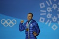 Olympic champion Oleksandr Abramenko of Ukraine celebrates victory in the Men`s Aerials Freestyle Skiing at the 2018 Olympics Royalty Free Stock Photo