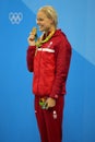 Olympic champion Pernille Blume of Denmark celebrates victory during medal ceremony after Women`s 50 metre freestyle final