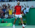 Olympic champion Rafael Nadal of Spain in action during men`s singles semifinal match of the Rio 2016 Olympic Games Royalty Free Stock Photo