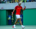 Olympic champion Rafael Nadal of Spain in action during men`s singles semifinal match of the Rio 2016 Olympic Games Royalty Free Stock Photo