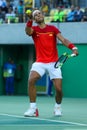 Olympic champion Rafael Nadal of Spain in action during men`s singles semifinal match of the Rio 2016 Olympic Games Royalty Free Stock Photo