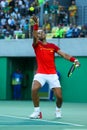 Olympic champion Rafael Nadal of Spain in action during men`s singles semifinal match of the Rio 2016 Olympic Games Royalty Free Stock Photo