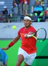 Olympic champion Rafael Nadal of Spain in action during men`s singles semifinal match of the Rio 2016 Olympic Games Royalty Free Stock Photo