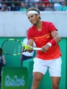 Olympic champion Rafael Nadal of Spain in action during men`s singles semifinal of the Rio 2016 Olympic Games Royalty Free Stock Photo