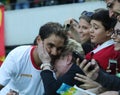 Olympic champion Rafael Nadal of Spain with tennis fan after men`s singles semifinal of the Rio 2016 Olympic Games Royalty Free Stock Photo