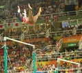 Olympic champion Simone Biles of United States competes on the uneven bars at women's team all-around gymnastics at Rio 2016