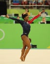 Olympic champion Simone Biles of USA competes on the floor exercise during women's all-around gymnastics qualification