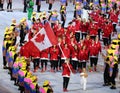 Olympic champion trampoline gymnast Rosie MacLennan carrying Canadian flag leading the Olympic team Canada in the Rio 2016 Opening