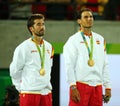 Olympic champions Mark Lopez and Rafael Nadal of Spain during medal ceremony after victory at men's doubles final