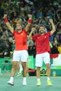 Olympic champions Rafael Nadal and Mark Lopez of Spain celebrate victory at men's doubles final of the Rio 2016 Olympics