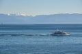 Olympic mountains and boat marina in puget sound washington state