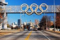 The Olympic Rings over the street Royalty Free Stock Photo