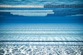 Olympic Swimming pool under water background Royalty Free Stock Photo