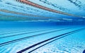 Olympic Swimming pool under water background Royalty Free Stock Photo