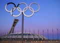 Olympics rings with montreal stadium in background