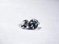 Shiny diamond stones laying on white table desk Royalty Free Stock Photo
