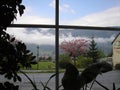 View from the window to low clouds in Ossiach settlement, Austria