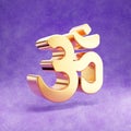 Om icon. Gold glossy Om symbol isolated on violet velvet background.