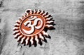 Om pendent on wood background and greeting