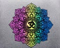 Om, symbol Aum, in a colorful mandala with vibrant, joyful colors on a gray background