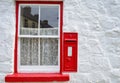 Traditional house with mail box at Ulster American Folk Park, Northern Ireland. Royalty Free Stock Photo