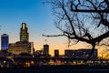 Setting sun over Omaha downtown buildings; FNBO, WoodmenLife building Royalty Free Stock Photo