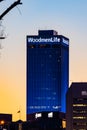 Setting sun over Omaha downtown buildings; WoodmenLife building Royalty Free Stock Photo