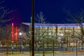 Omaha Nebraska USA Convention Center with backdrop of lighted Bob Kerrey bridge at night just after sunset