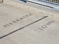 Nebraska Iowa borderline on the Bob Kerrey Pedestrian Bridge, Omaha, Nebraska