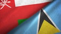 Oman and Saint Lucia two flags textile cloth, fabric texture