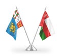 Oman and Saint Pierre and Miquelon table flags isolated on white 3D rendering