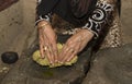 Omani lady making local bread