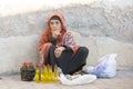 Omani lady selling oil at the Nizwa market