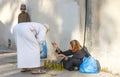Omani lady selling oil at the Nizwa market