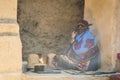 Omani lady in traditional omani kitchen