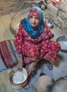 Omani lady in traditional omani kitchen