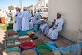 Omani man selling spices