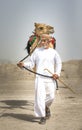 Omani men with camels after a race