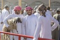 Omani people at a traditional goat market Royalty Free Stock Photo