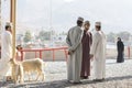 Omani people at a traditional goat market Royalty Free Stock Photo